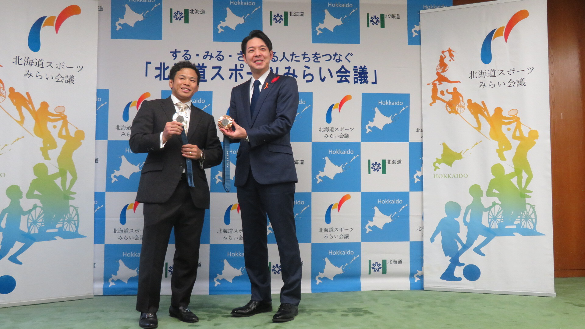 知事と選手